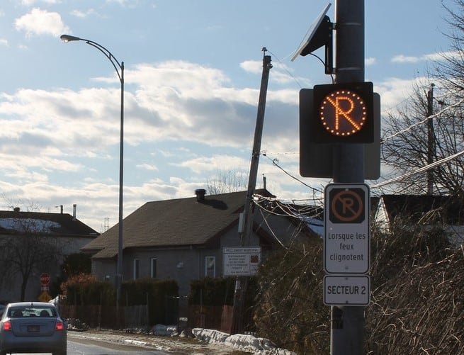 Longueuil ajoute un feu sur le stationnement sur rue en hiver