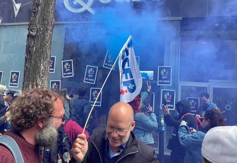 Les membres du SCFP ont manifesté leur mécontentement le 8 juin, entre autres devant une succursale montréalaise de la SQDC. Photo : Facebook du SCFP 5454